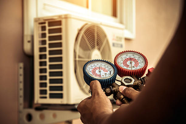 Professional Air Conditioning Service technician working in Adkins, TX
